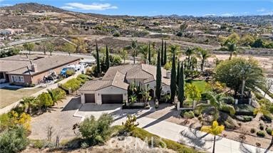 7780 Solitude Court Riverside, CA 92506 - Photo 57 of 63 an aerial view of a house with a yard