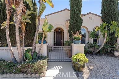 7780 Solitude Court Riverside, CA 92506 - Photo 6 of 63 a front view of a house with a garden