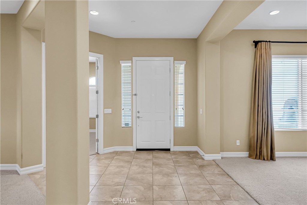 7780 Solitude Court Riverside, CA 92506 - Photo 9 of 63 an empty room with windows and closet