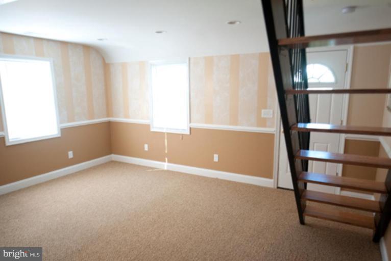 3127 Sollers Point Road Dundalk, MD 21222 - Photo 13 of 14 a view of an empty room with a window