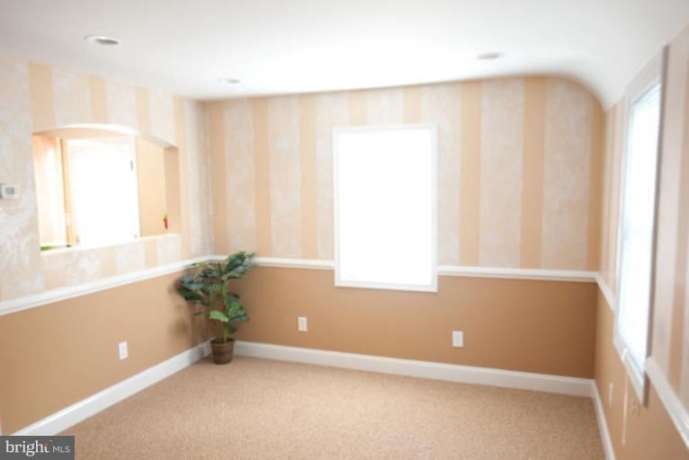 3127 Sollers Point Road Dundalk, MD 21222 - Photo 14 of 14 an empty room with windows
