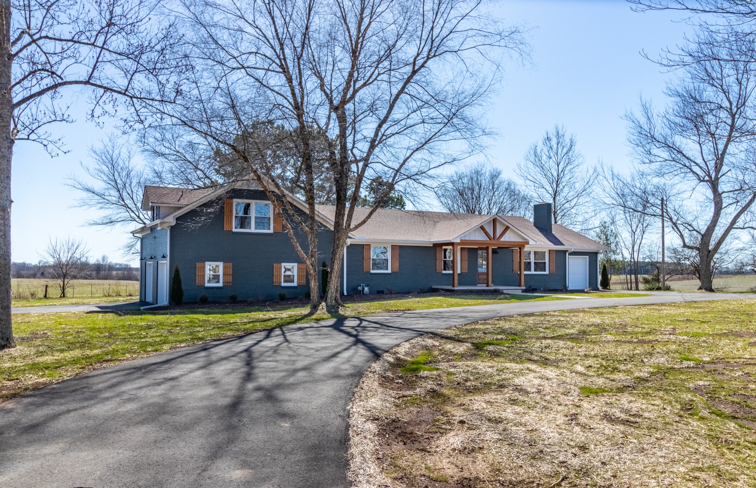169 Dunn Fall River Road Leoma, TN 38468 - Photo 1 of 34 a front view of a house with a yard