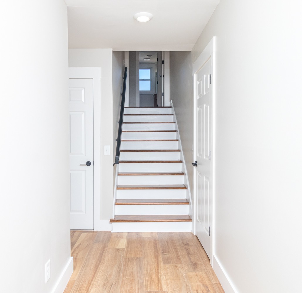 169 Dunn Fall River Road Leoma, TN 38468 - Photo 23 of 34 a view of a hallway with wooden floor and entryway