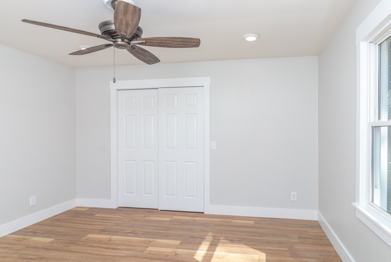 169 Dunn Fall River Road Leoma, TN 38468 - Photo 28 of 34 a view of a livingroom with wooden floor and a window