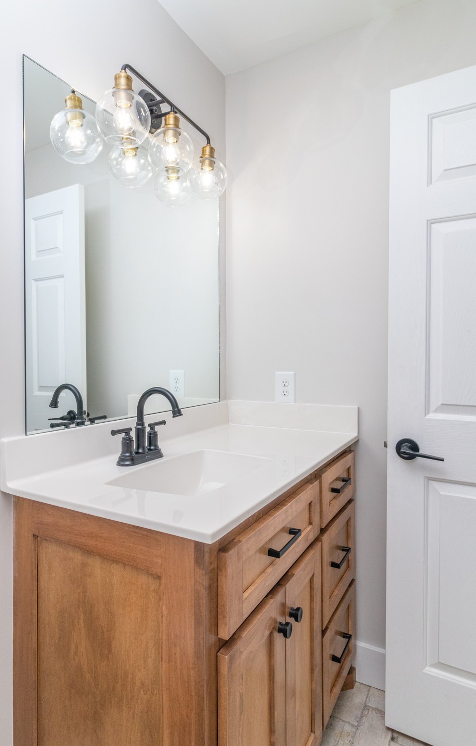 169 Dunn Fall River Road Leoma, TN 38468 - Photo 30 of 34 a bathroom with a sink vanity and a mirror