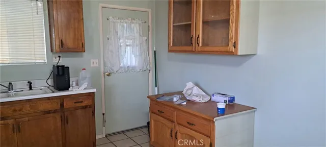 a view of a utility room with racks on the wall
