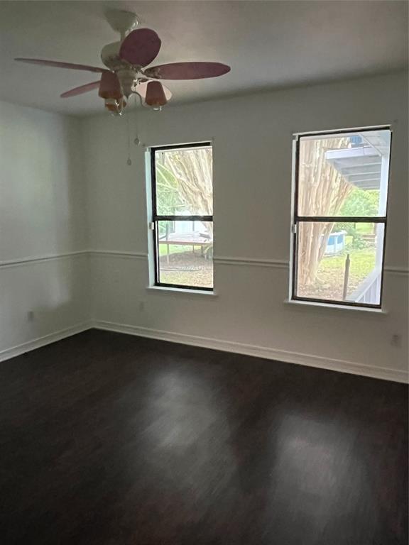 1401 Linton Road Benton, LA 71006 - Photo 13 of 19 a view of an empty room with wooden floor and a window