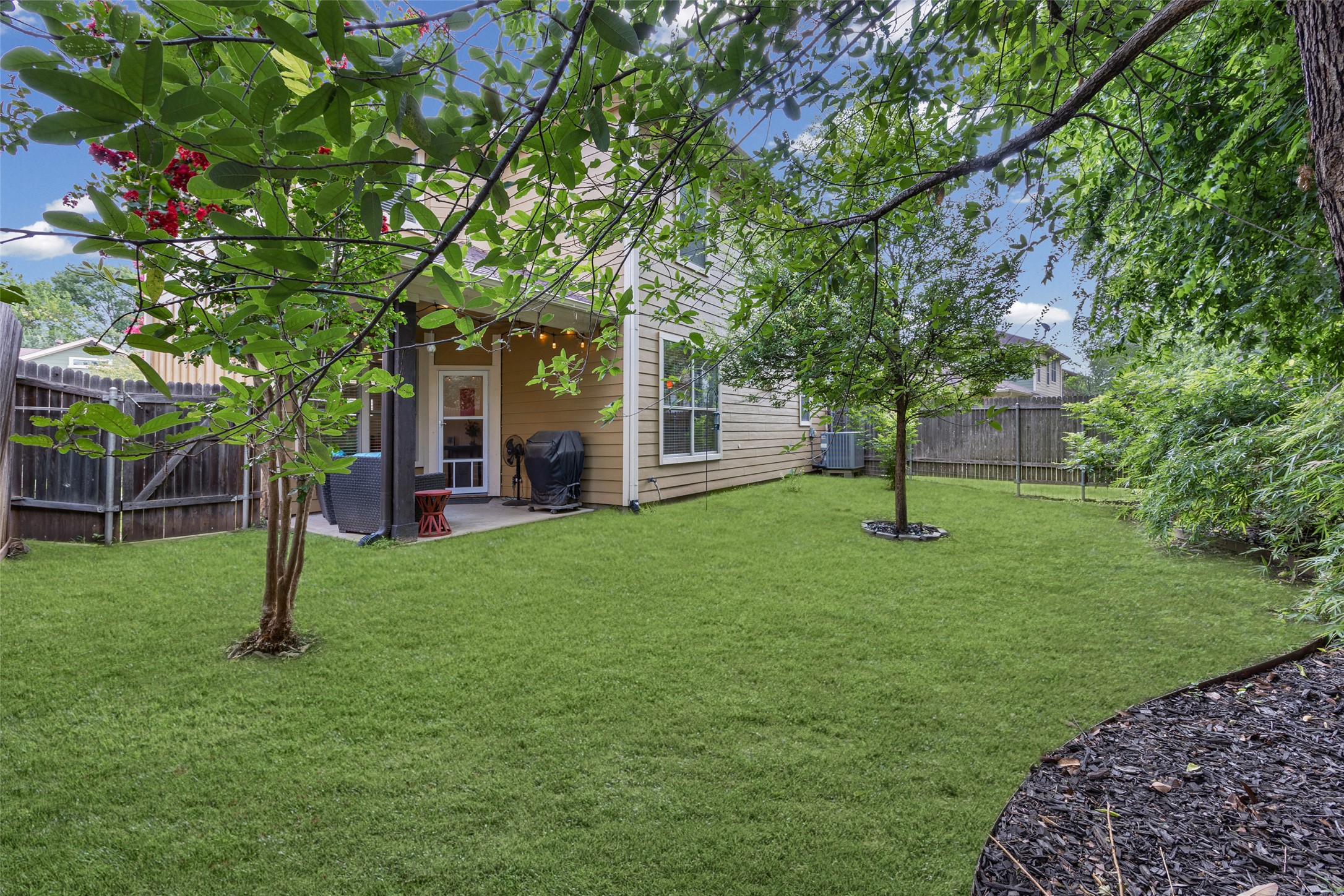 6708 Menchaca Road, Unit 10 Austin, TX 78745 - Photo 30 of 30 The large, private backyard provides an ideal setting for outdoor enjoyment. Best of all, the HOA covers mowing!