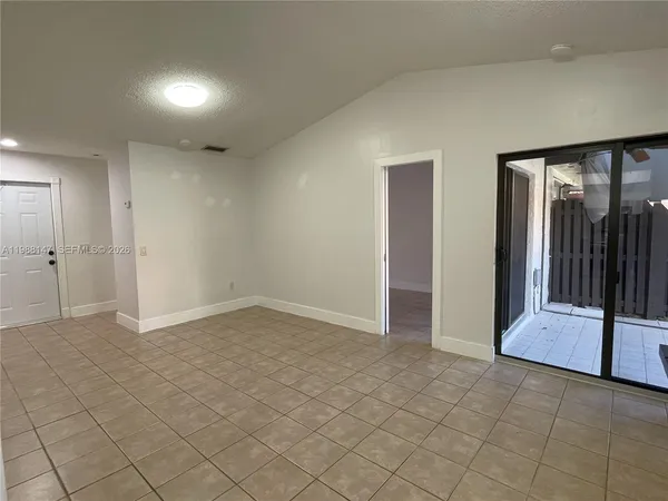 an empty room with fan