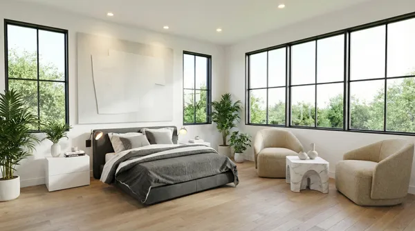 a spacious bedroom with a bed and a large window