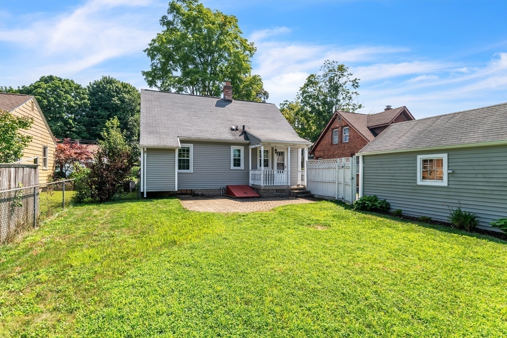 168 Ellsworth Avenue Springfield, MA 01118 - Photo 5 of 38 a view of a house with a yard