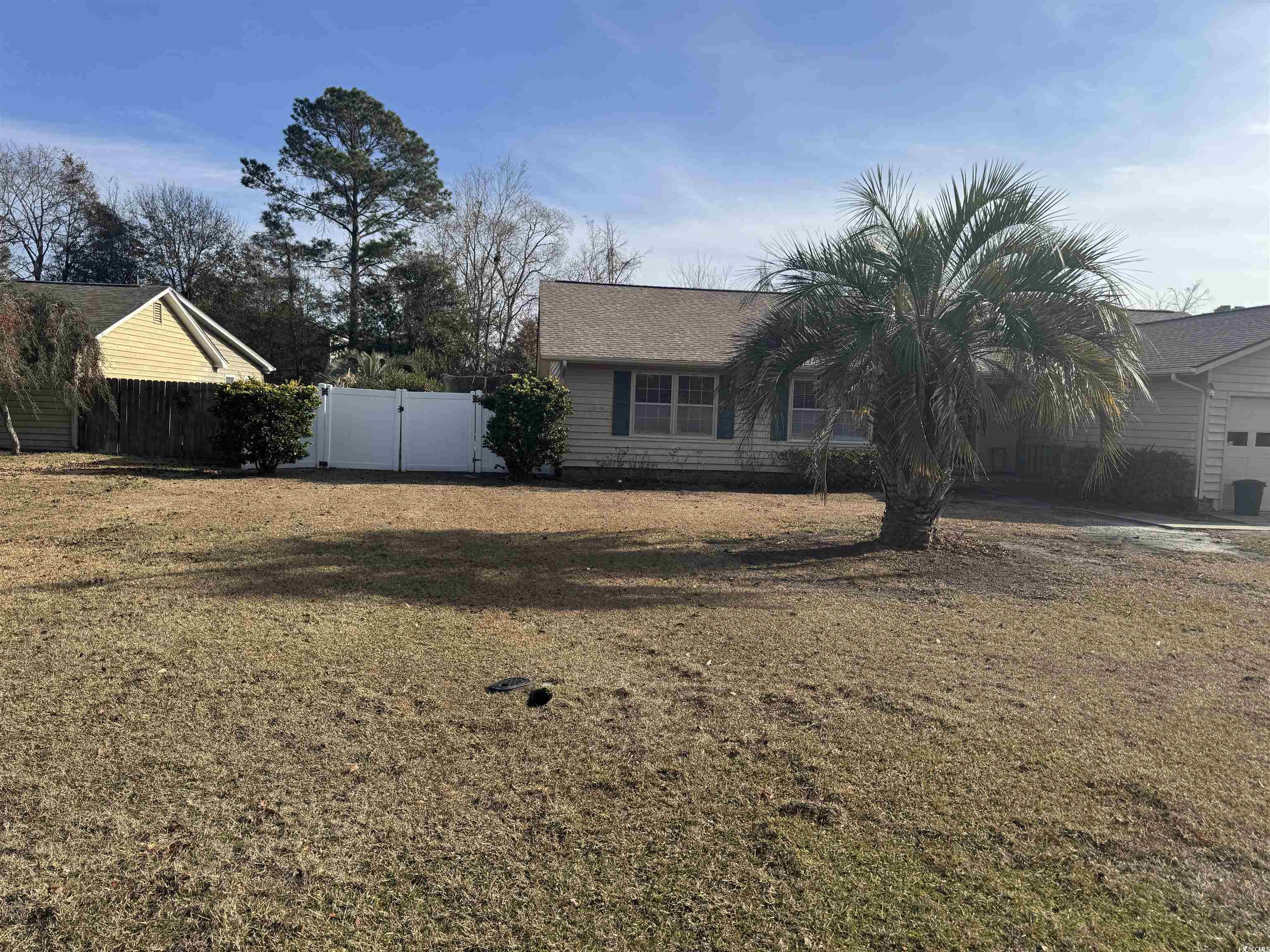 22 Pine Valley Lane Surfside Beach, SC 29575 - Photo 4 of 4 View of front of home featuring a gate