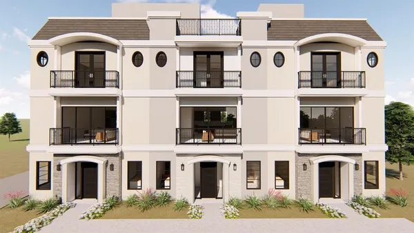 a front view of a multi story apartment building