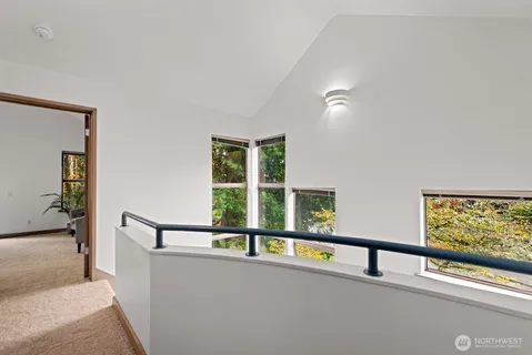 a view of a living room with a large window