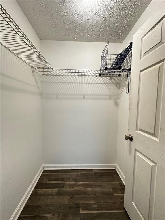 16103 Waldrop Cove Decatur, GA 30034 - Photo 13 of 17 a view of a room with racks on the wall