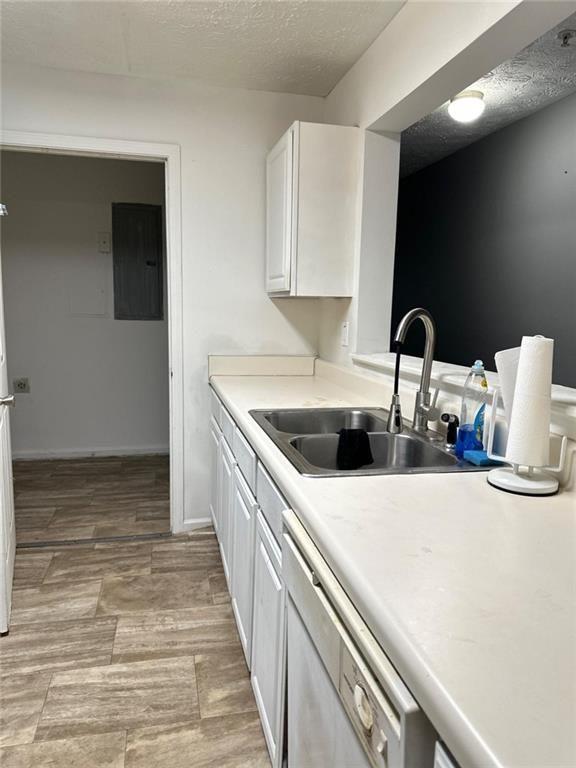 16103 Waldrop Cove Decatur, GA 30034 - Photo 2 of 17 a kitchen with a sink and a stove top oven