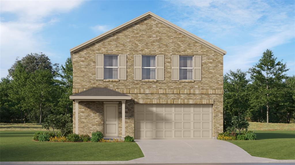 View of front of property featuring brick siding, a front yard, driveway, and a garage