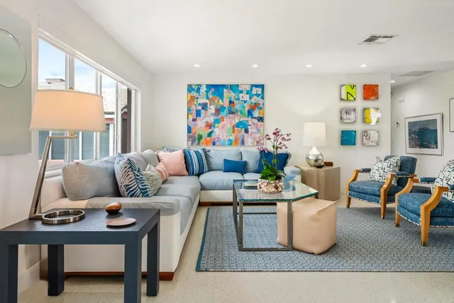 a living room with furniture and a couch