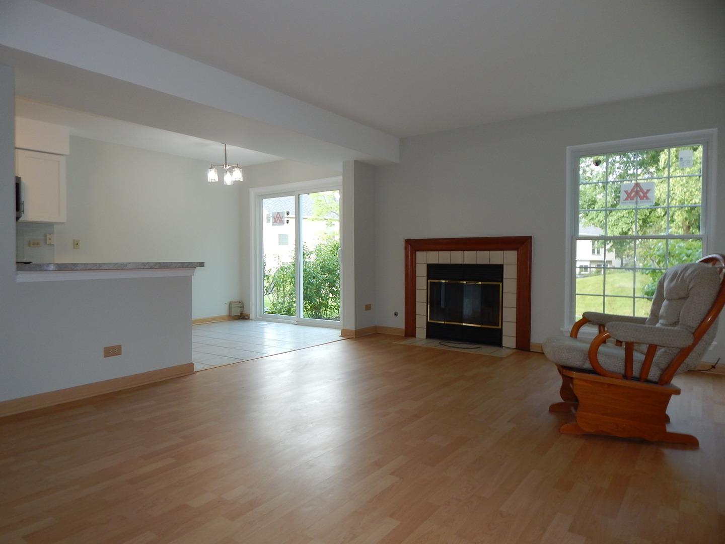 1 North Oltendorf Road Streamwood, IL 60107 - Photo 3 of 18 a living room with furniture and a fireplace