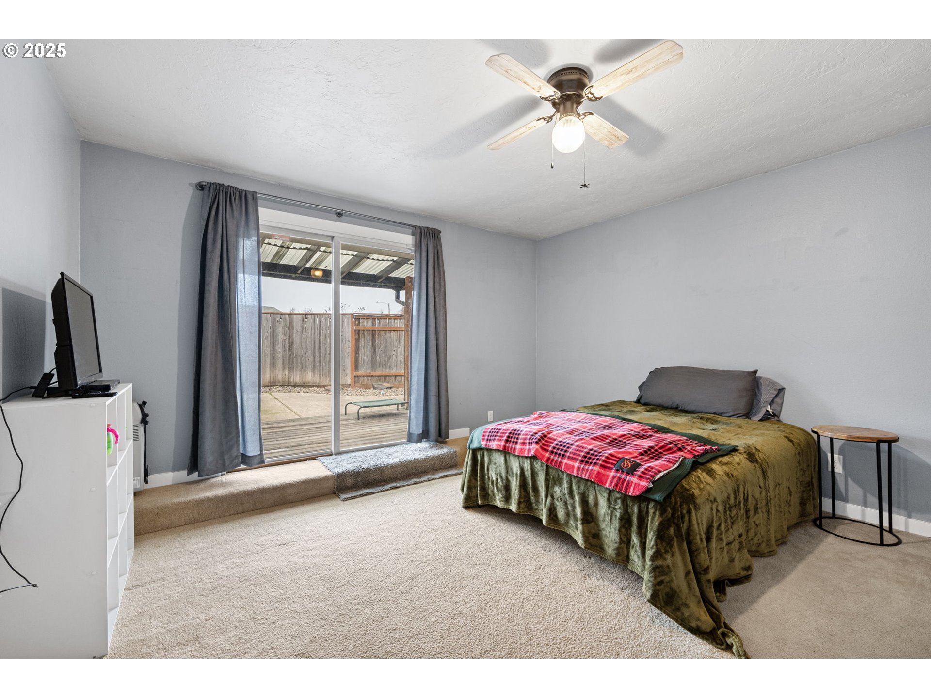 296 65th Street Springfield, OR 97478 - Photo 18 of 33 a bedroom with a bed and a window