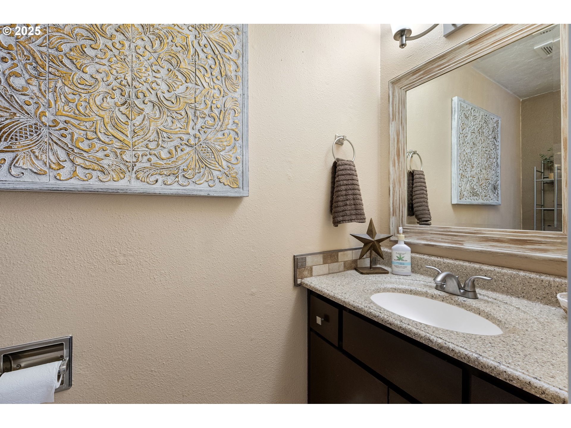 296 65th Street Springfield, OR 97478 - Photo 24 of 33 a bathroom with a granite countertop sink and a mirror