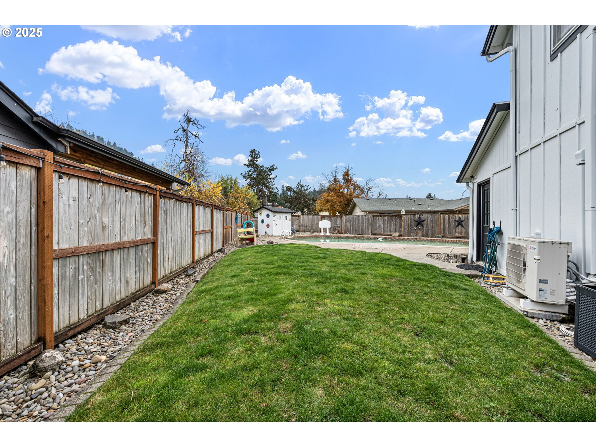 296 65th Street Springfield, OR 97478 - Photo 26 of 33 a view of a backyard with garden