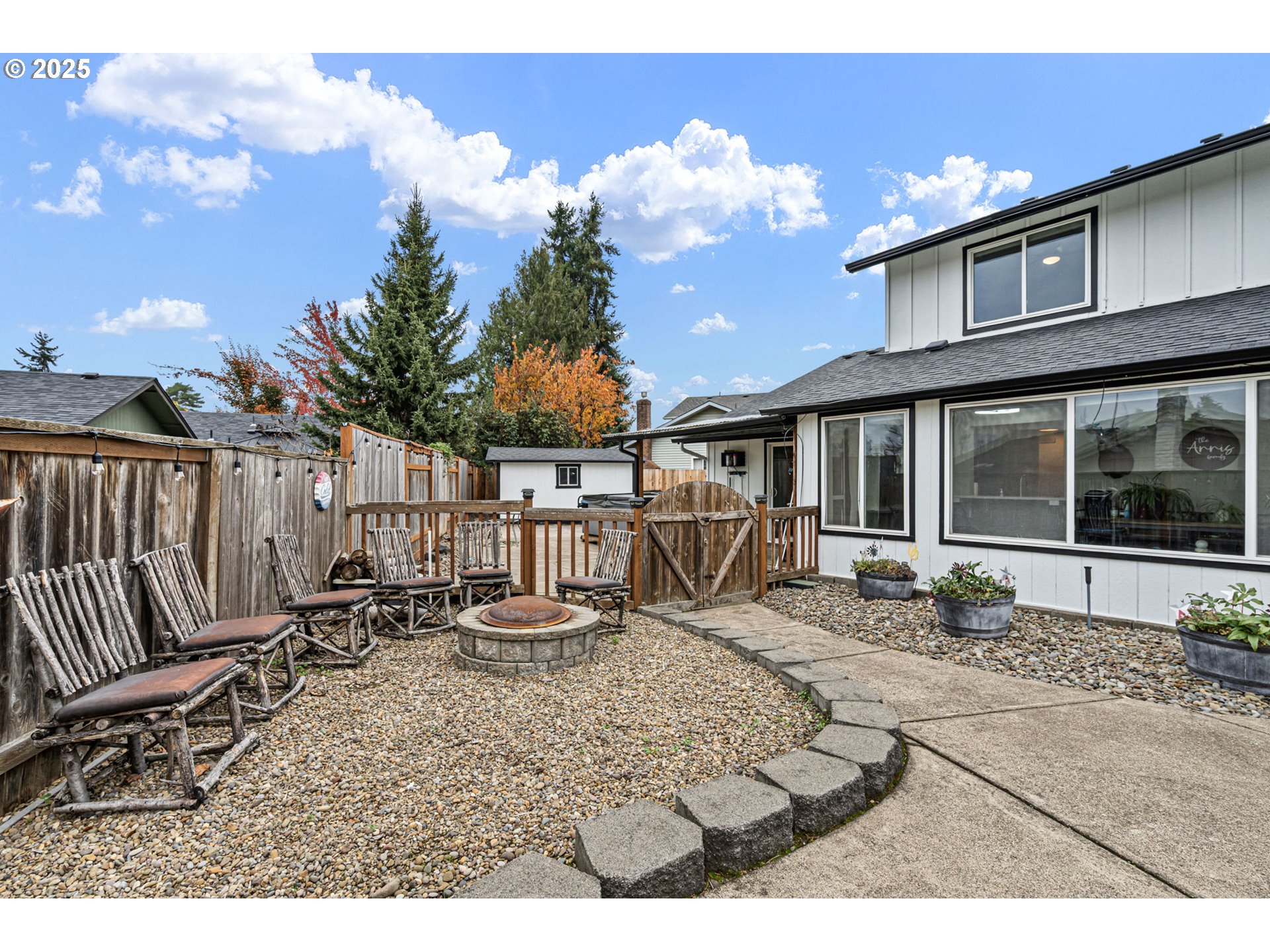 296 65th Street Springfield, OR 97478 - Photo 28 of 33 a view of a house with backyard and sitting area