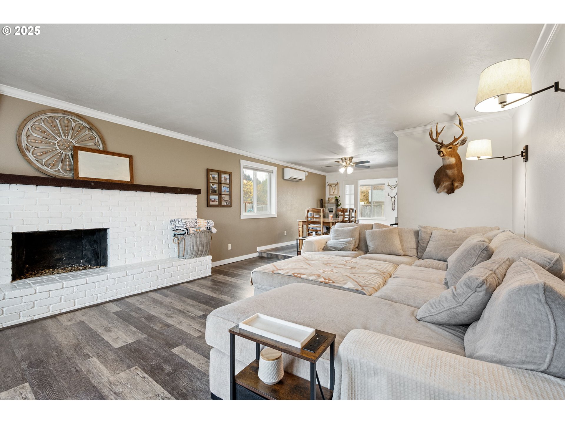 296 65th Street Springfield, OR 97478 - Photo 4 of 33 a living room with furniture and a fireplace