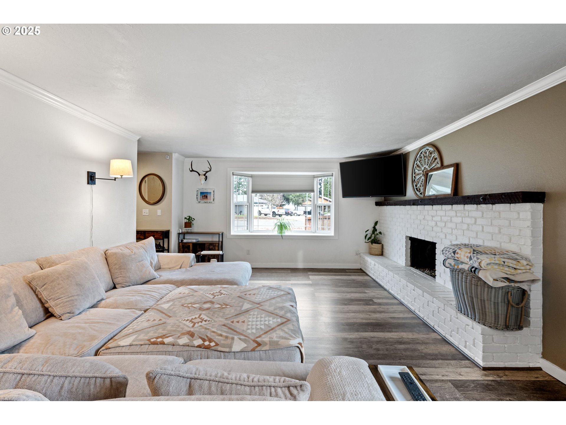 296 65th Street Springfield, OR 97478 - Photo 5 of 33 a living room with furniture and a fireplace