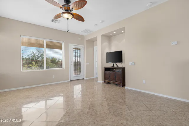 a view of workspace with a flat screen tv