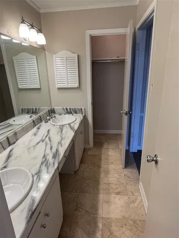 a bathroom with a toilet and bathtub