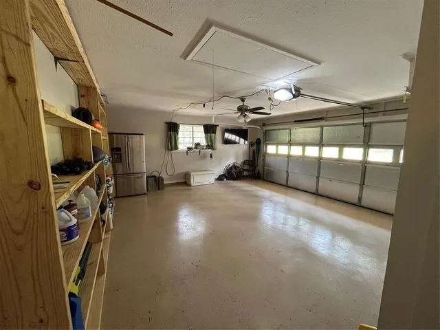 a view of a garage with furniture