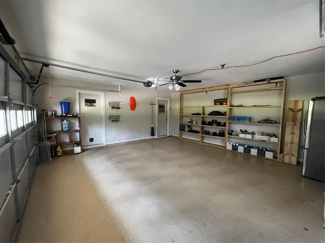 a big house with trees in front of it