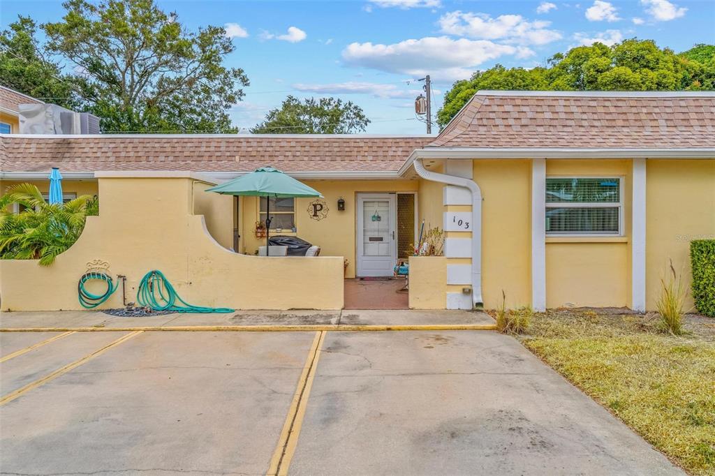 610 Indian Rocks Road North, Unit 103 Belleair Bluffs, FL 33770 - Photo 2 of 23 front view of house