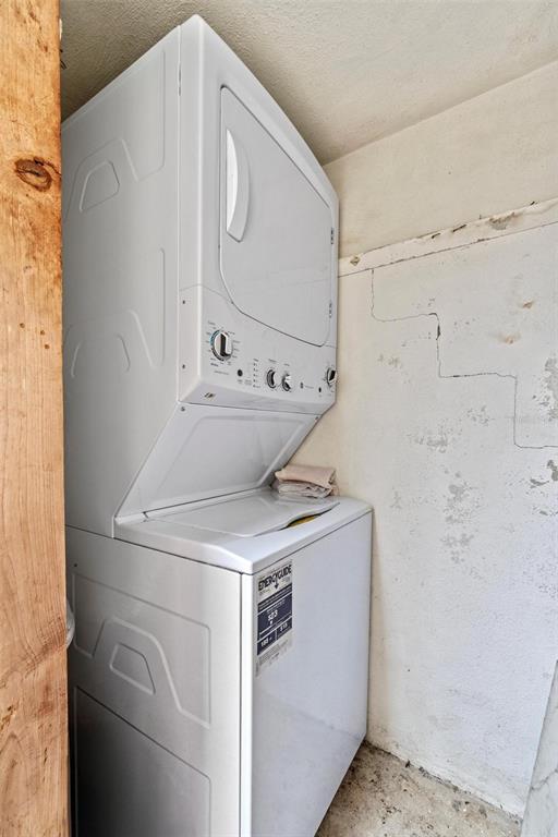 610 Indian Rocks Road North, Unit 103 Belleair Bluffs, FL 33770 - Photo 23 of 23 a utility room with dryer and washer