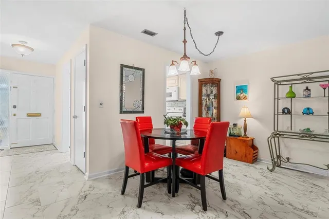 a view of a dining room with furniture