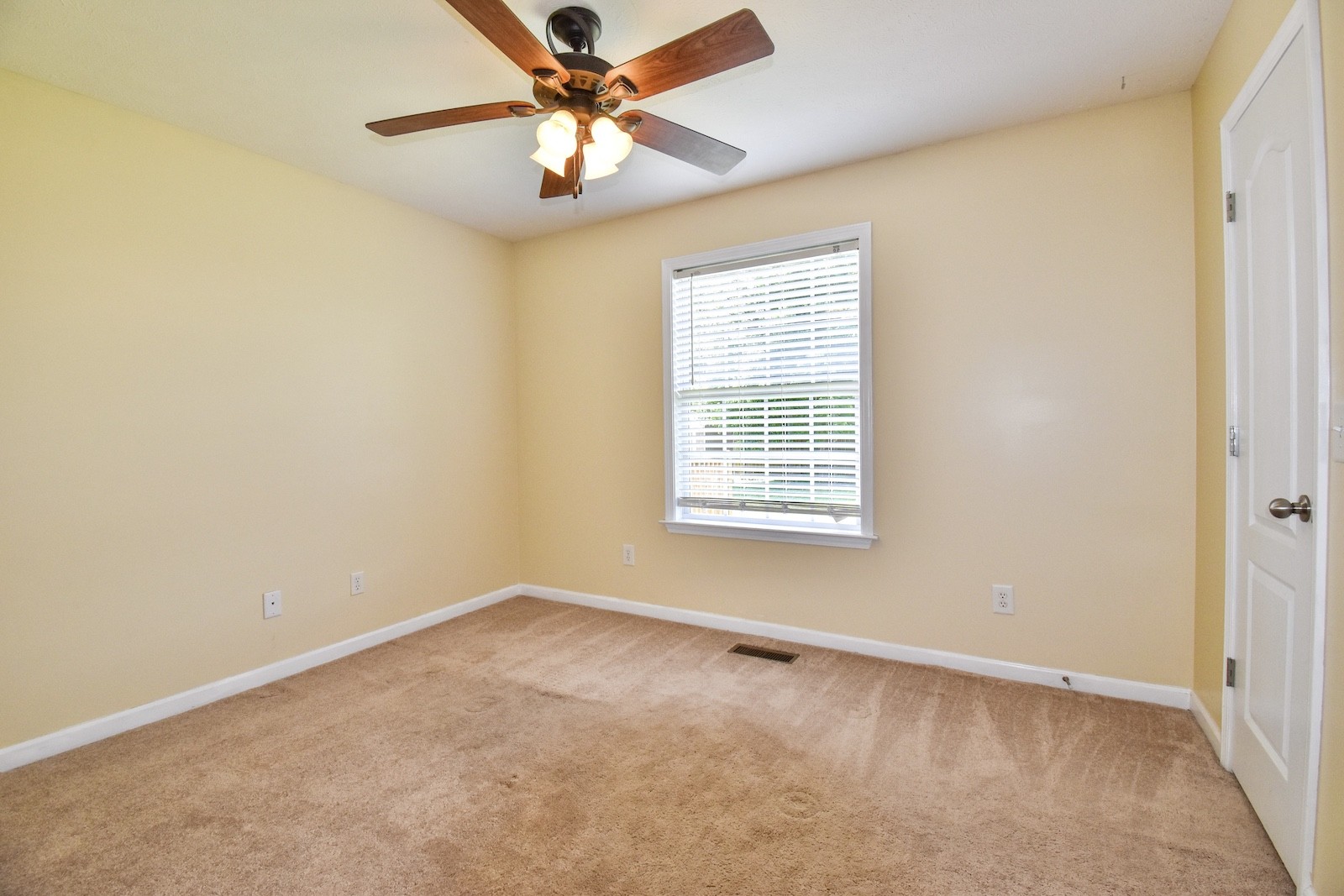 1621 Robert Road Columbia, TN 38401 - Photo 18 of 34 an empty room with windows and fan