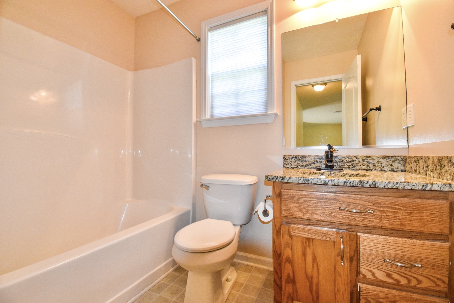 1621 Robert Road Columbia, TN 38401 - Photo 22 of 34 a bathroom with a granite countertop sink toilet and shower