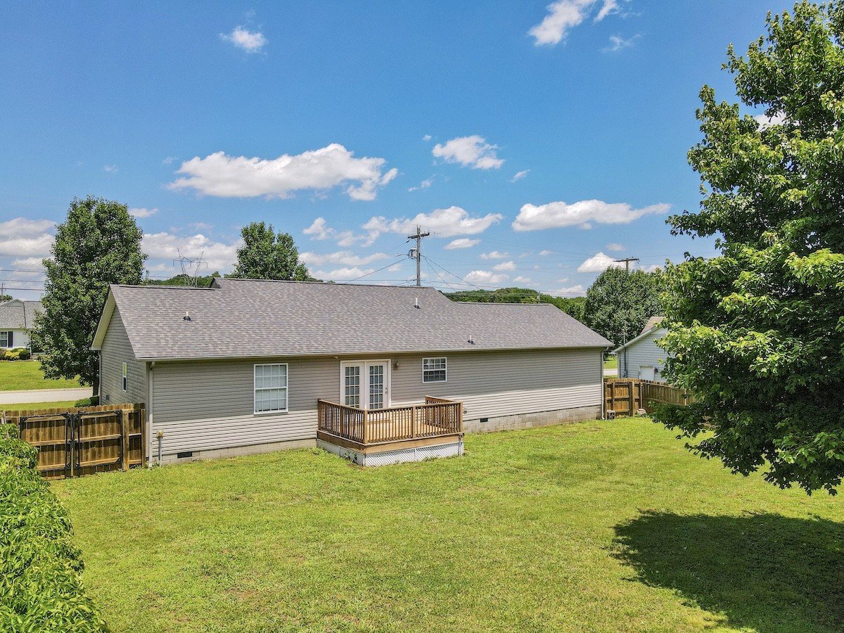 1621 Robert Road Columbia, TN 38401 - Photo 25 of 34 a aerial view of a house with swimming pool and a yard