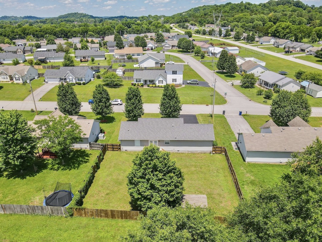 1621 Robert Road Columbia, TN 38401 - Photo 30 of 34 an aerial view of residential houses with outdoor space and swimming pool