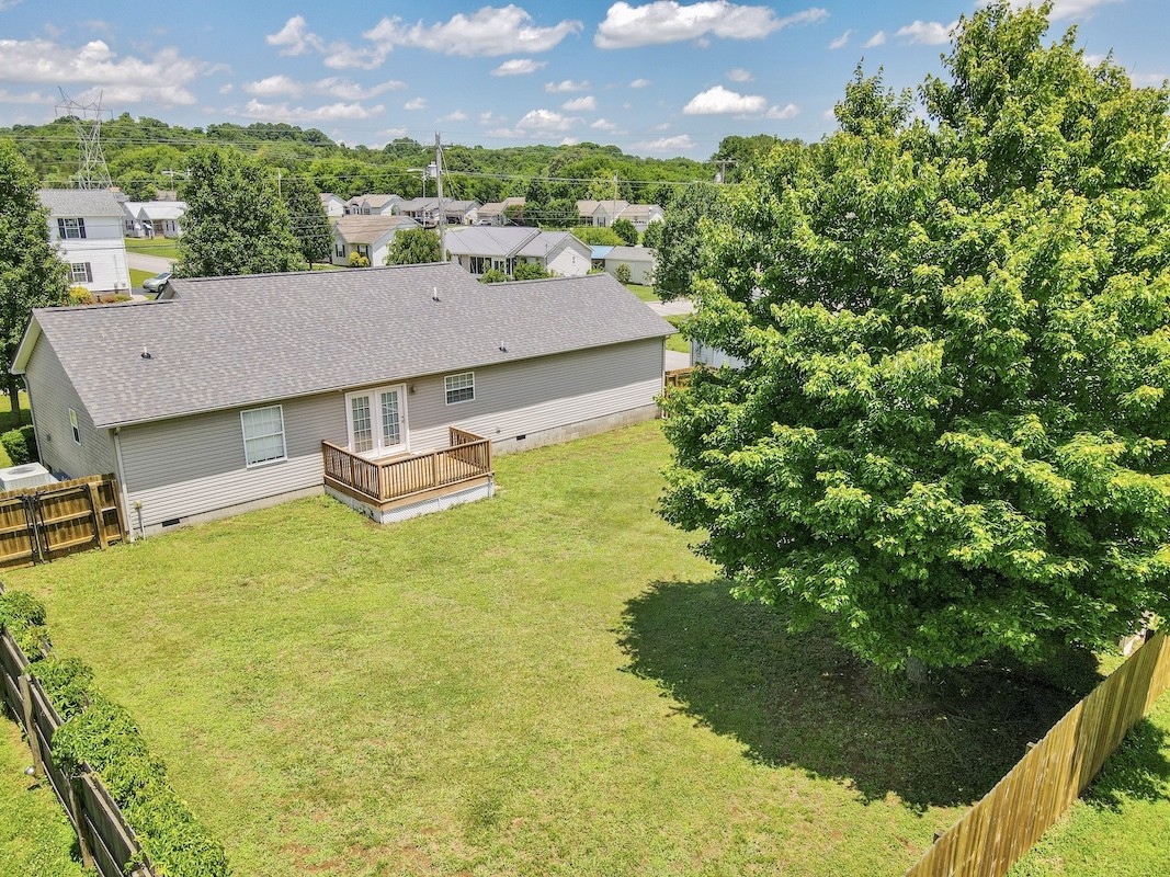 1621 Robert Road Columbia, TN 38401 - Photo 31 of 34 a aerial view of a house with a garden and trees