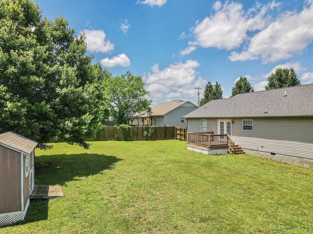 1621 Robert Road Columbia, TN 38401 - Photo 32 of 34 a view of a house with a yard and sitting area