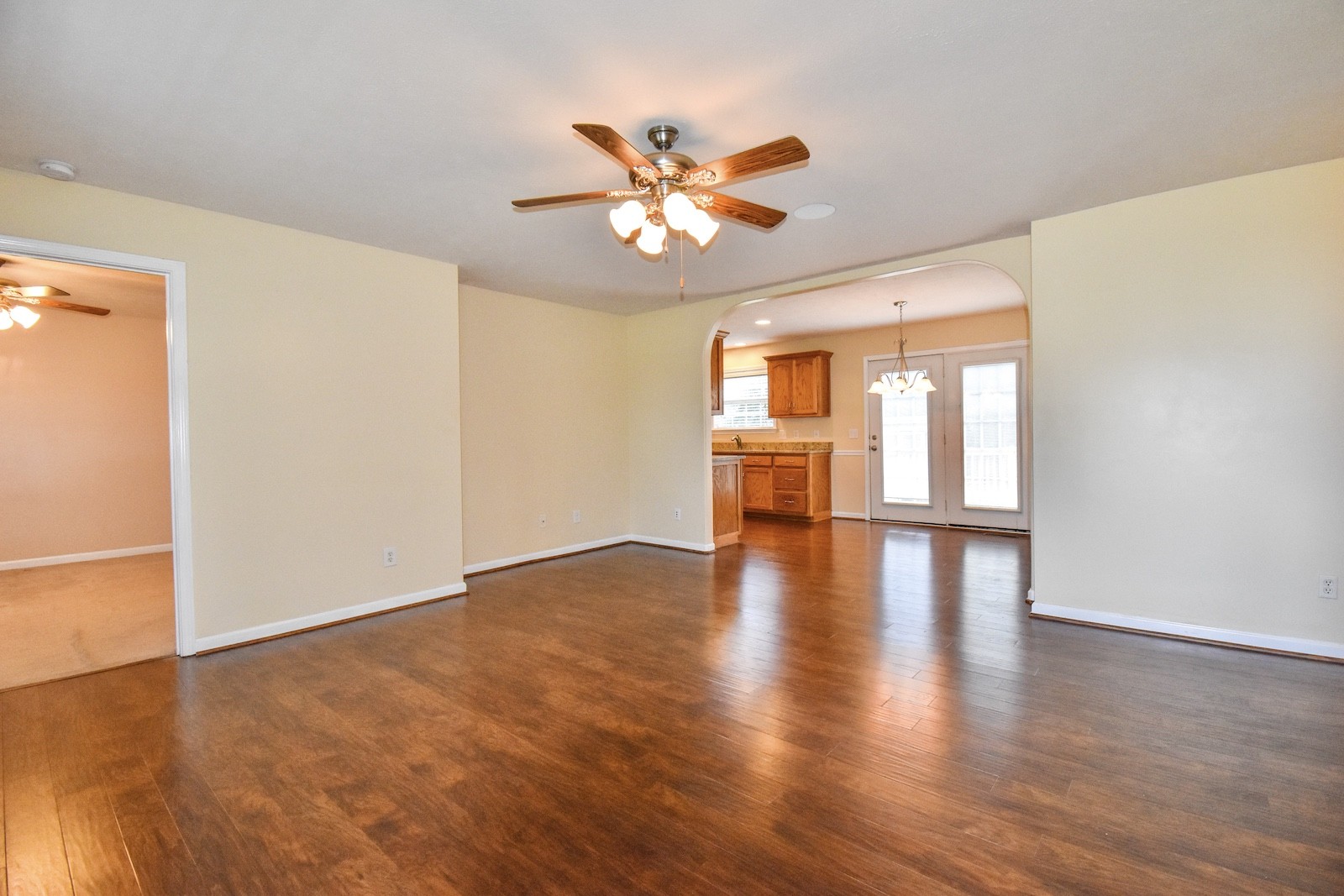 1621 Robert Road Columbia, TN 38401 - Photo 5 of 34 a view of an empty room with window and wooden floor