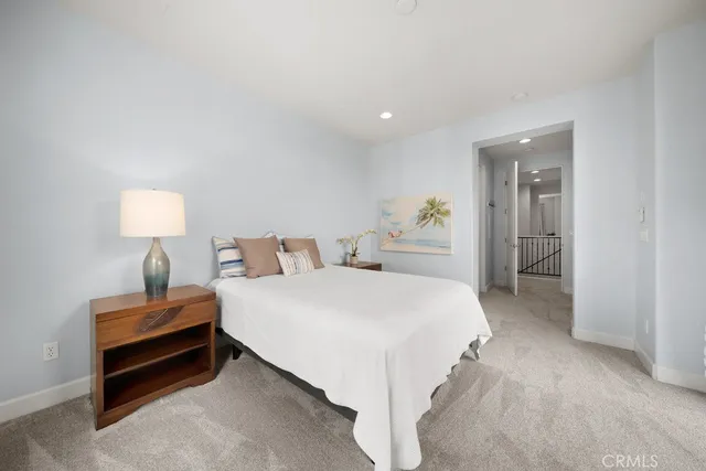 a bathroom with a shower and a glass door