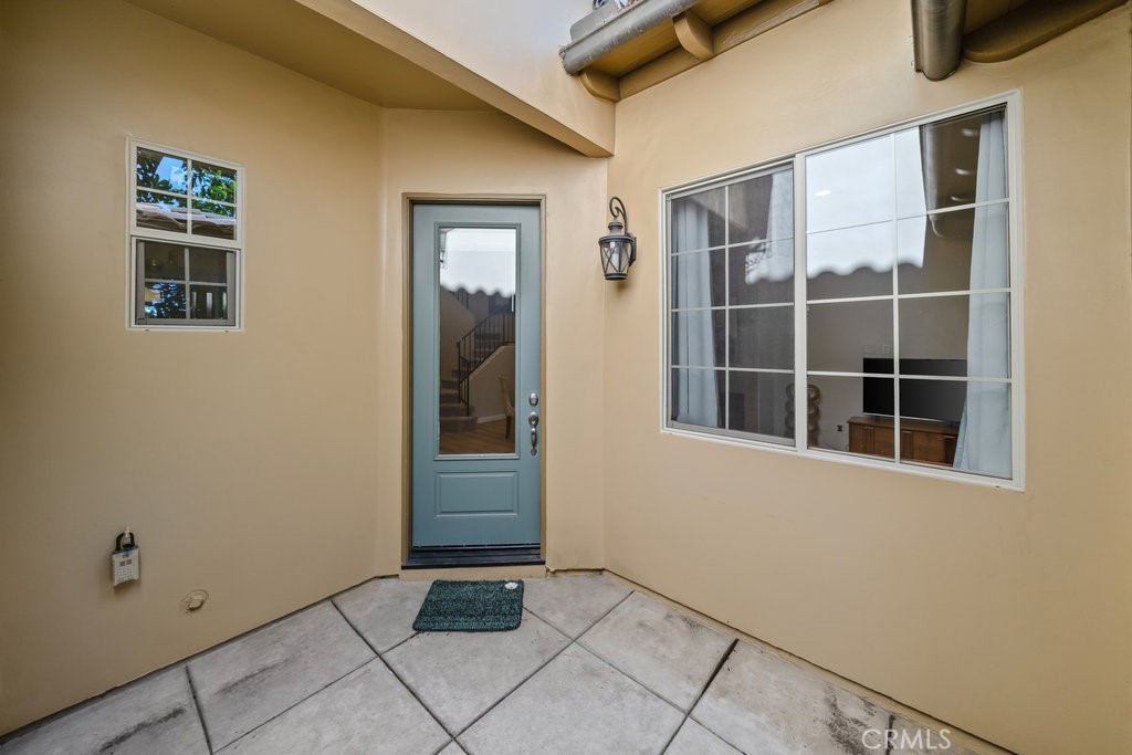 1156 Spring Azure Way Nipomo, CA 93444 - Photo 3 of 60 a view of an empty room with windows