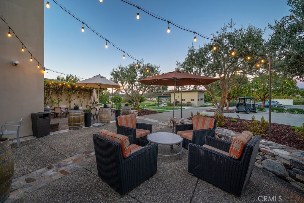 1156 Spring Azure Way Nipomo, CA 93444 - Photo 45 of 60 a view of a patio with couches and potted plants