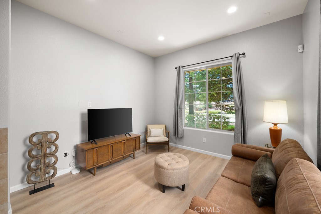 1156 Spring Azure Way Nipomo, CA 93444 - Photo 5 of 60 a living room with furniture and a flat screen tv