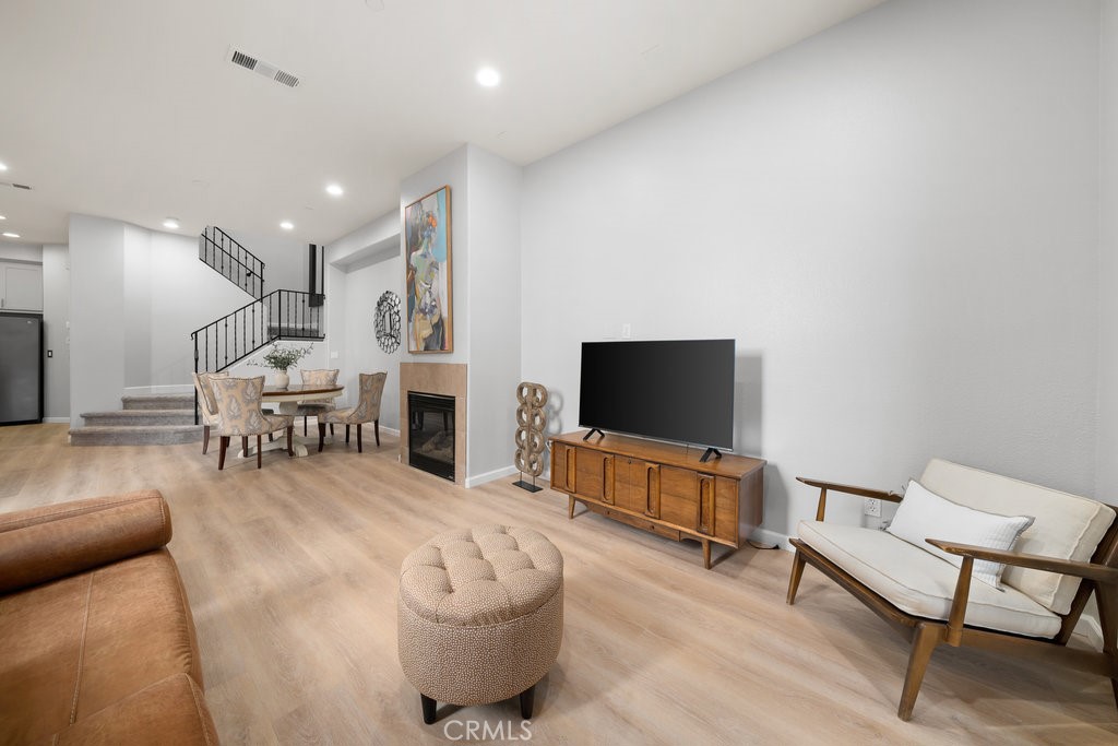 1156 Spring Azure Way Nipomo, CA 93444 - Photo 6 of 60 a living room with furniture and a flat screen tv