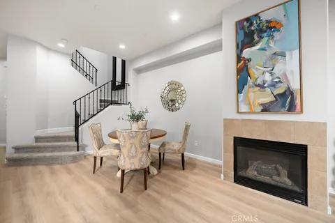 a view of a livingroom with furniture and a fireplace