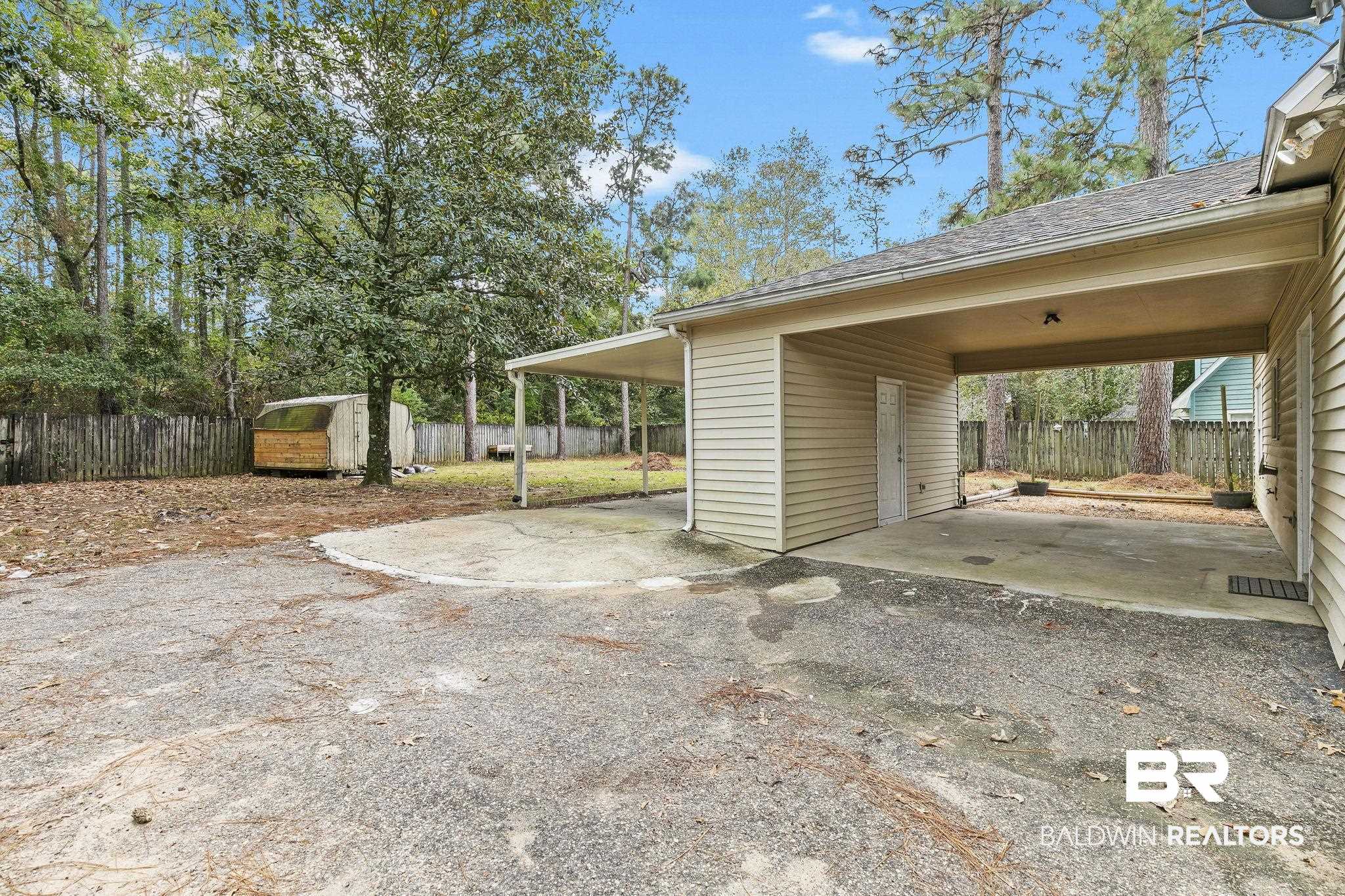 474 Ridgewood Drive Daphne, AL 36526 - Photo 47 of 57 Exterior space with a carport